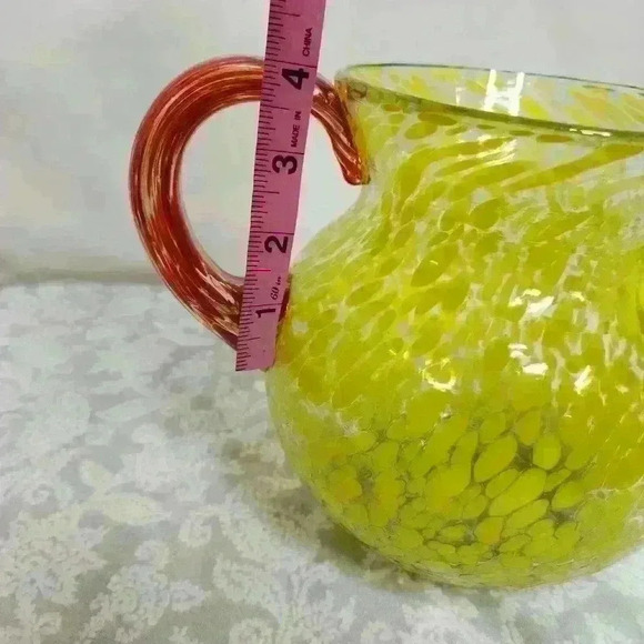 Hand-blown glass water pitcher yellow bubbles red handle. - Picture 9 of 10